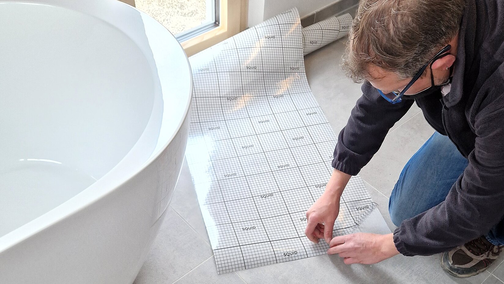 [Translate to English:] Hafttextil der Kooperation im Badezimmer