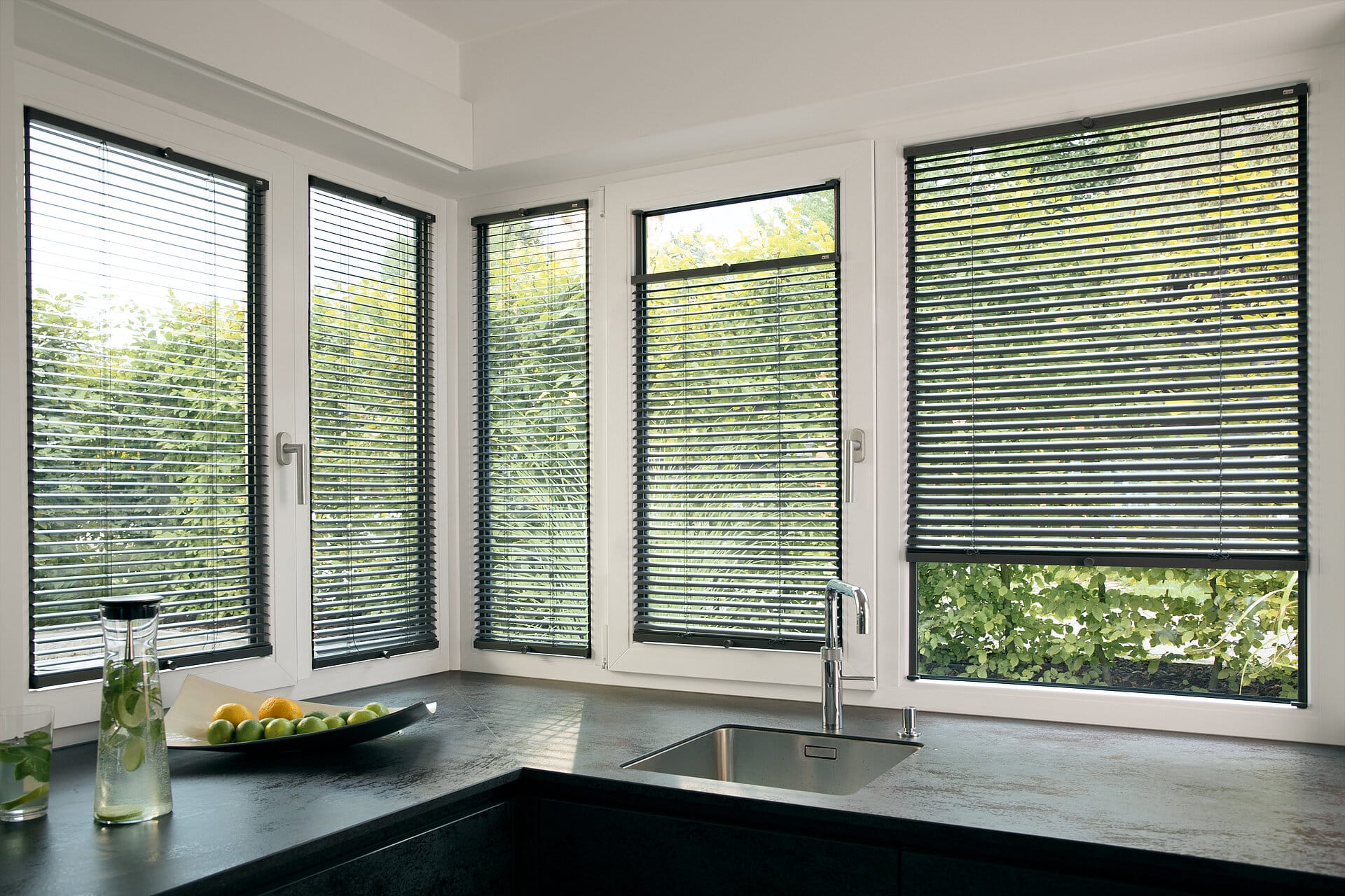 Venetian blinds on the window frame